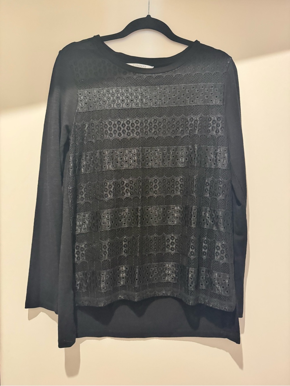 Black tunic top with patterned overlay